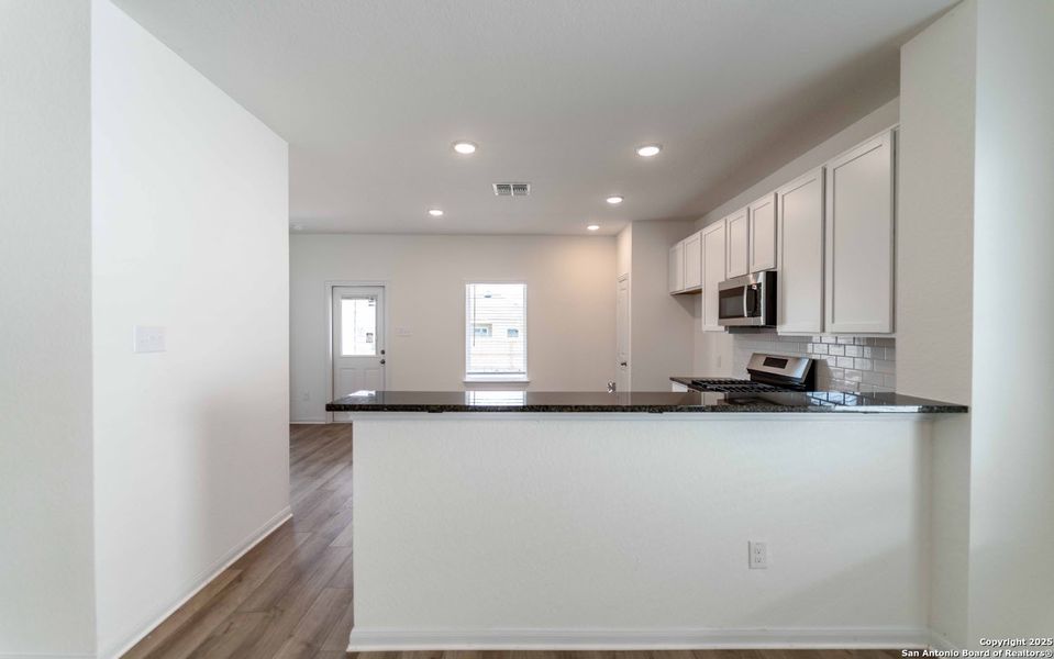 Furnished interior view inside a new home in Hennersby Hollow, San Antonio (Image 3). Furnished interior view inside a new home in Hennersby Hollow, San Antonio (Image 3).