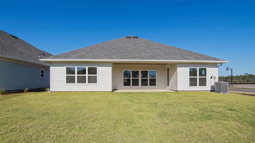 Representative exterior photo of a completed home built from the Camellia by D.R. Horton in Breakfast Point East Phase II, Panama City Beach, FL (Image 22).