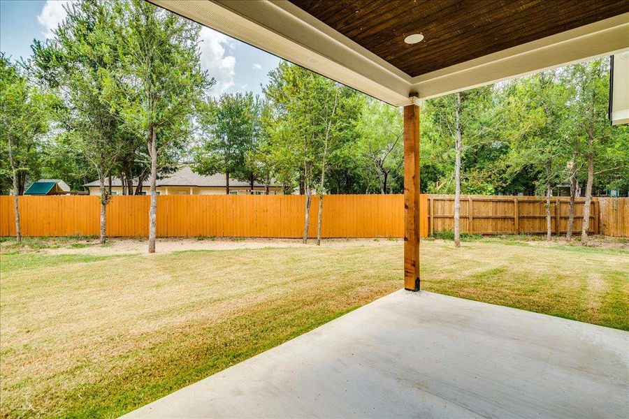 Exterior details and patio area of a home in , Bastrop (Image 27).