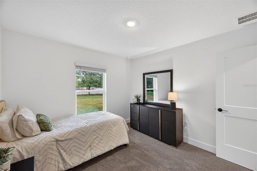 Furnished interior view inside a new home in Hill Country Estates, Dade City (Image 38).