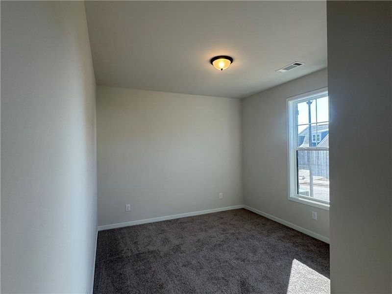 Spacious, unfurnished interior of a new home in Rosewood Lake Preserve, Hoschton (Image 19).