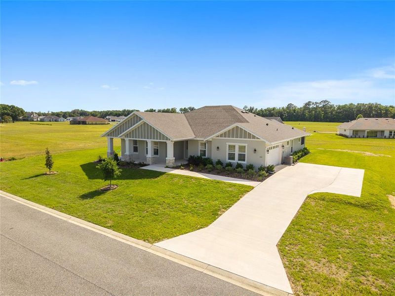 Front exterior of a new home in , Ocala, FL, highlighting curb appeal (Image 2). Front exterior of a new home in , Ocala, FL, highlighting curb appeal (Image 2).
