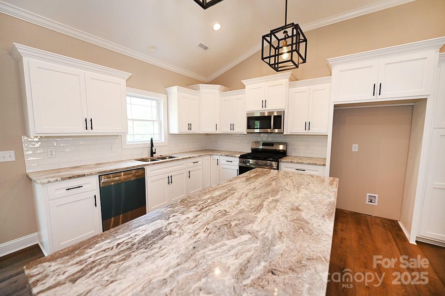 Furnished interior view inside a new home in , Hickory (Image 13).