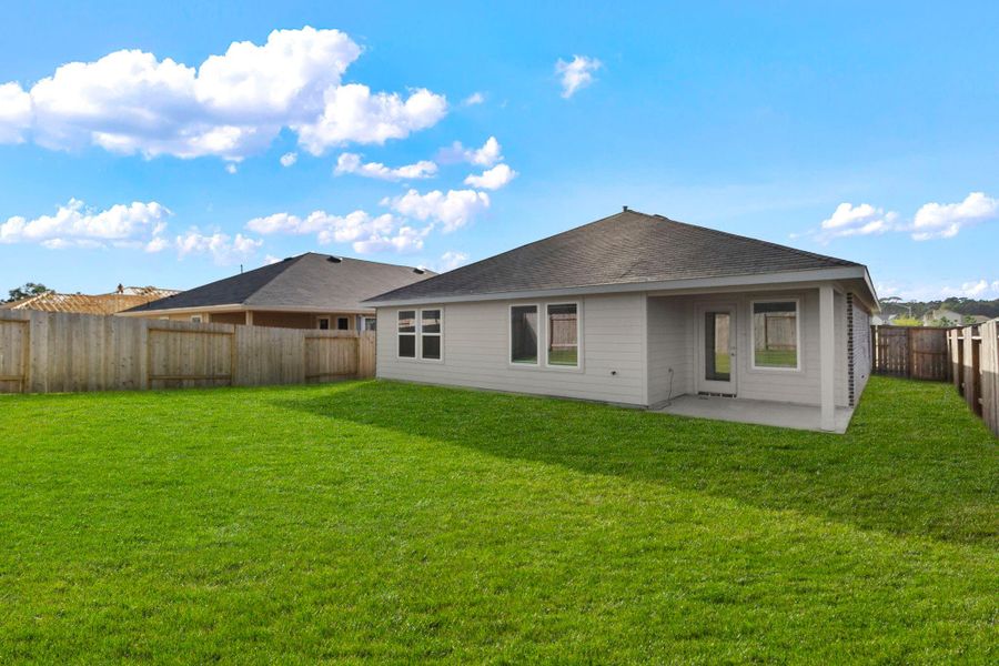 Exterior details and patio area of a home in , Splendora (Image 4).