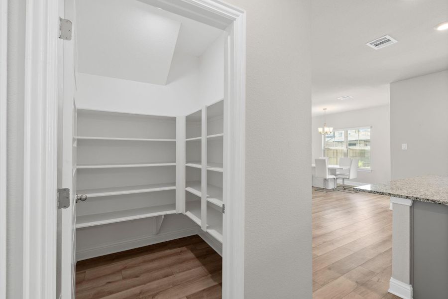 Spacious, unfurnished interior of a new home in Sunterra, Katy (Image 22).