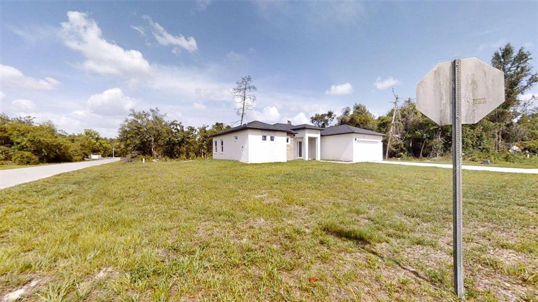 Front exterior of a new home in , Ocala, FL, highlighting curb appeal (Image 22).