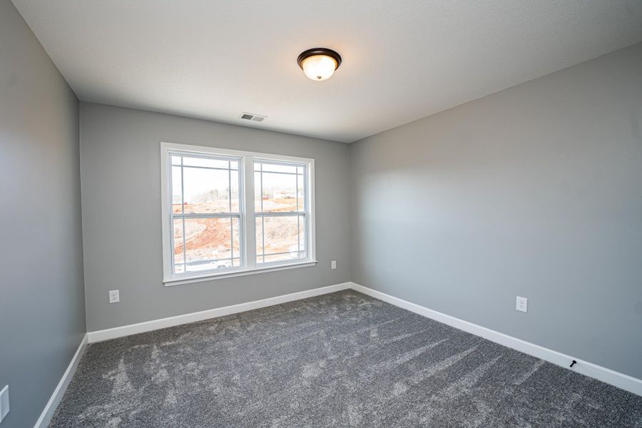 Representative unfurnished interior of a home built from the Sumter by Enchanted Homes in Lonesome Dove, San Antonio (Image 28).