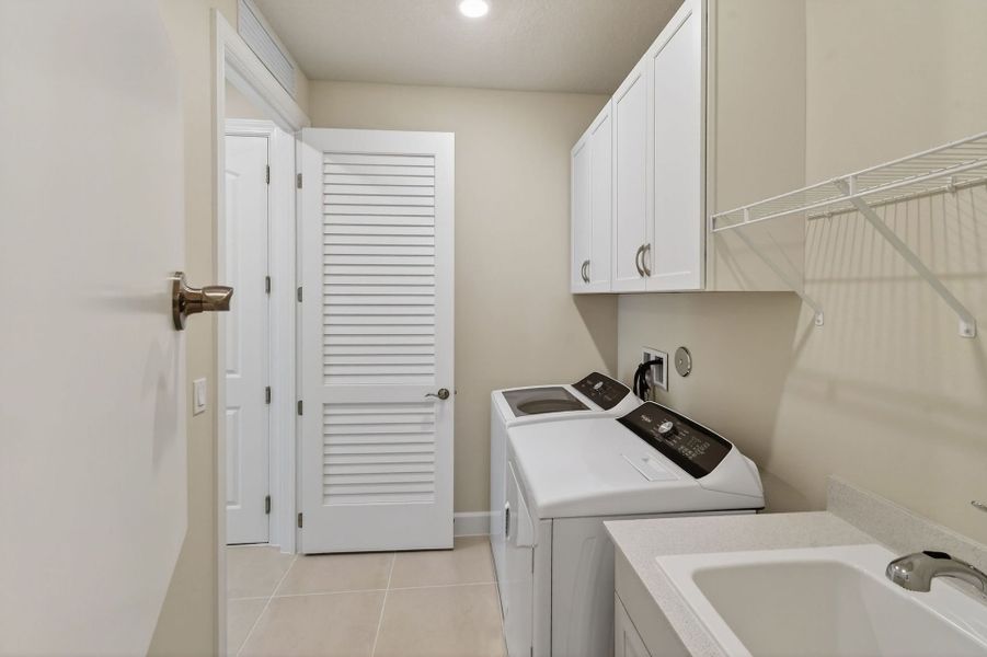 Furnished interior view inside a new home in Del Webb Tradition, Port St. Lucie (Image 50).