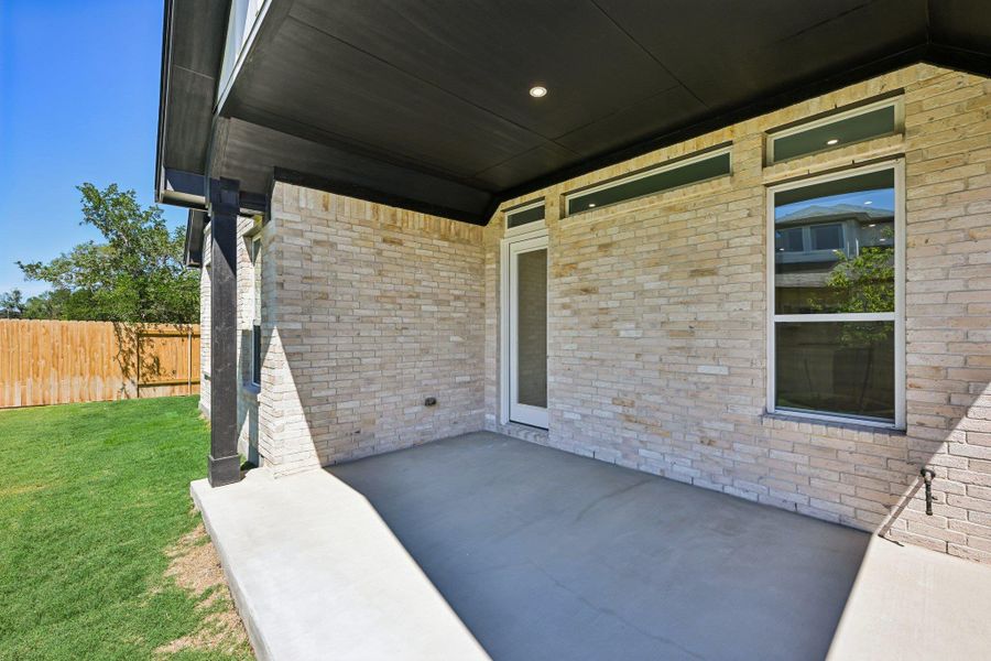 Exterior details and patio area of a home in Persimmon, Buda (Image 18). Exterior details and patio area of a home in Persimmon, Buda (Image 18).