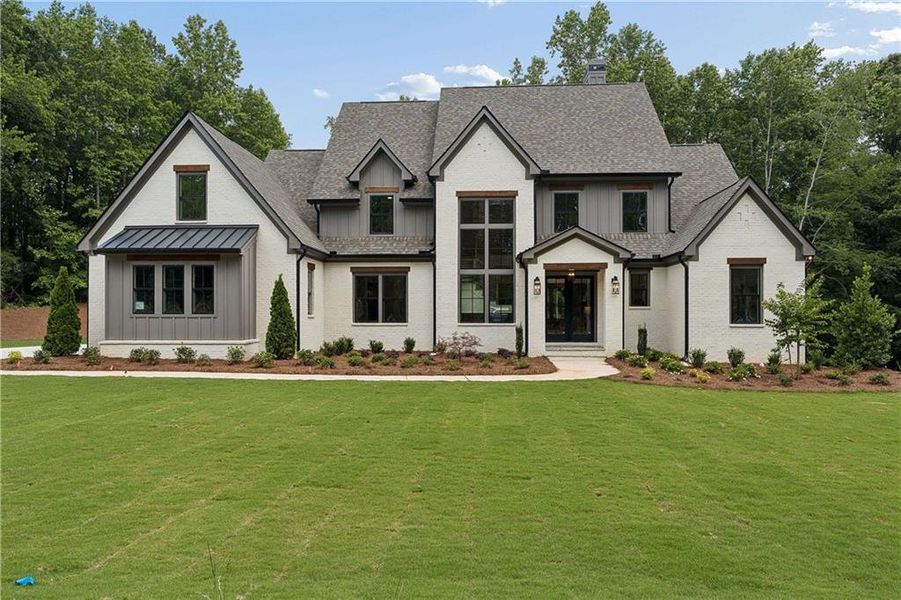 Front exterior of a new home in , Canton, GA, highlighting curb appeal (Image 26). Front exterior of a new home in , Canton, GA, highlighting curb appeal (Image 26).