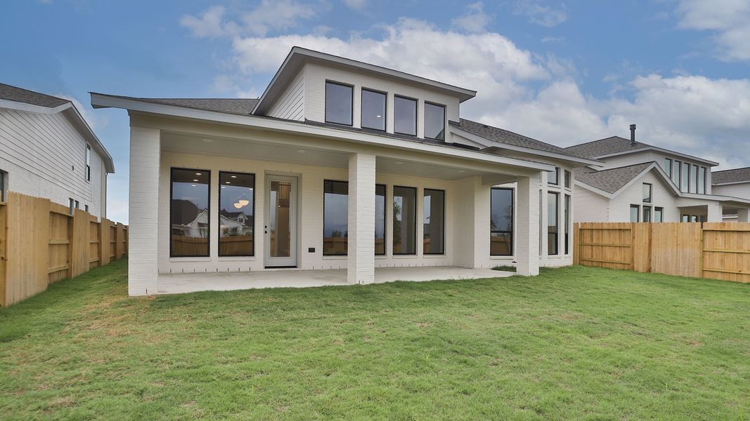 Exterior details and patio area of a home in Lakes of Cane Island, Katy (Image 3). Exterior details and patio area of a home in Lakes of Cane Island, Katy (Image 3).
