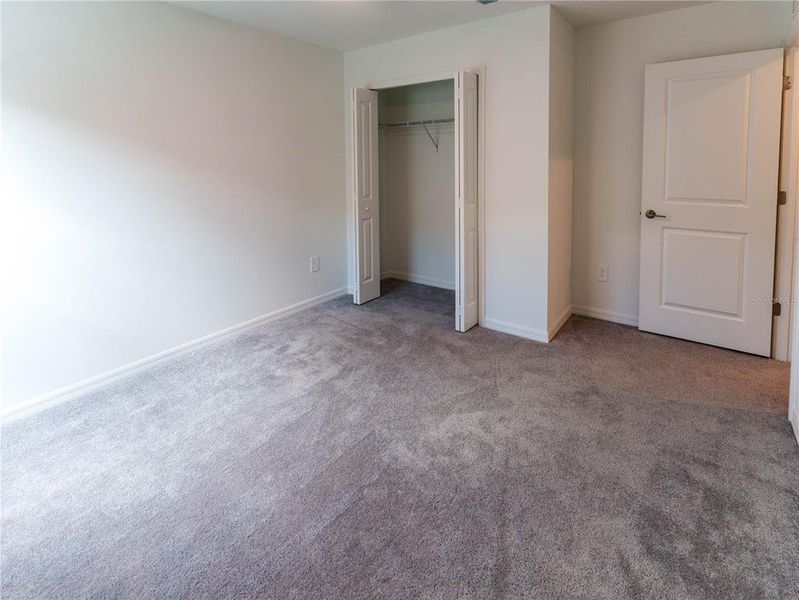 Spacious, unfurnished interior of a new home in The Isle of Avalon, Spring Hill (Image 26).