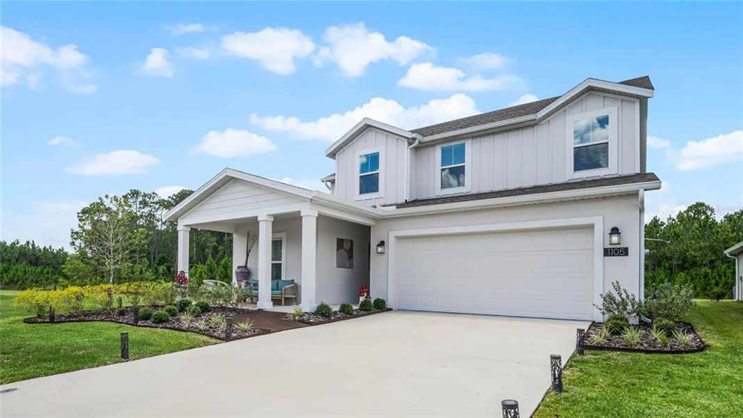 Front exterior of a new home in , Daytona Beach, FL, highlighting curb appeal (Image 19). Front exterior of a new home in , Daytona Beach, FL, highlighting curb appeal (Image 19).