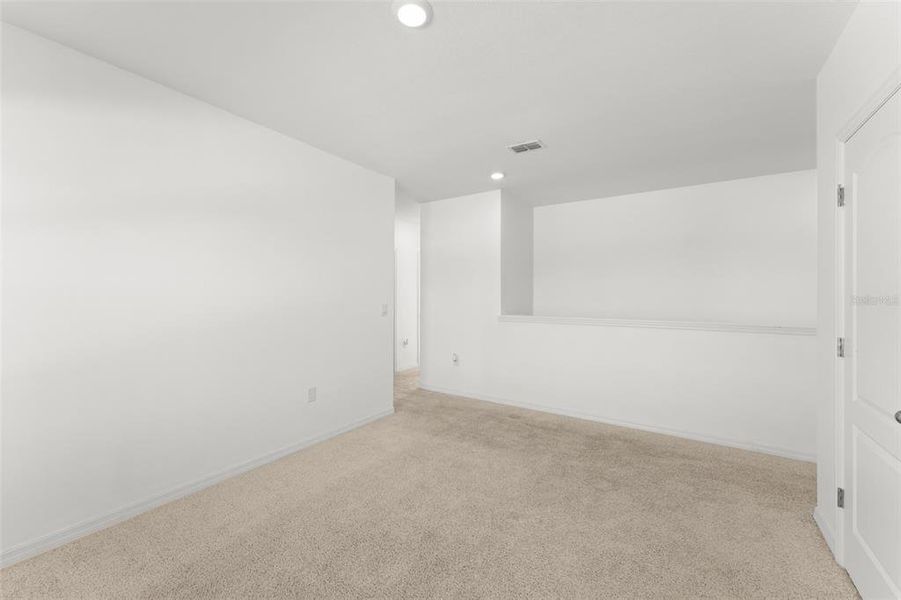 Spacious, unfurnished interior of a new home in Grace Ranch, Haines City (Image 29). Spacious, unfurnished interior of a new home in Grace Ranch, Haines City (Image 29).