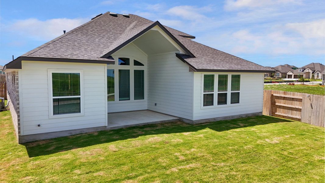 Exterior details and patio area of a home in Highland Village, Georgetown (Image 3).