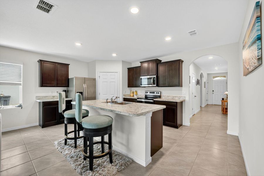 Furnished interior view inside a new home in , Port St. Lucie (Image 9).