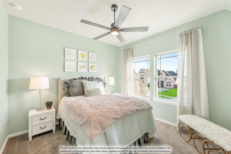 Bedroom with light green walls, ceiling fan, carpet, and large window with neighborhood view