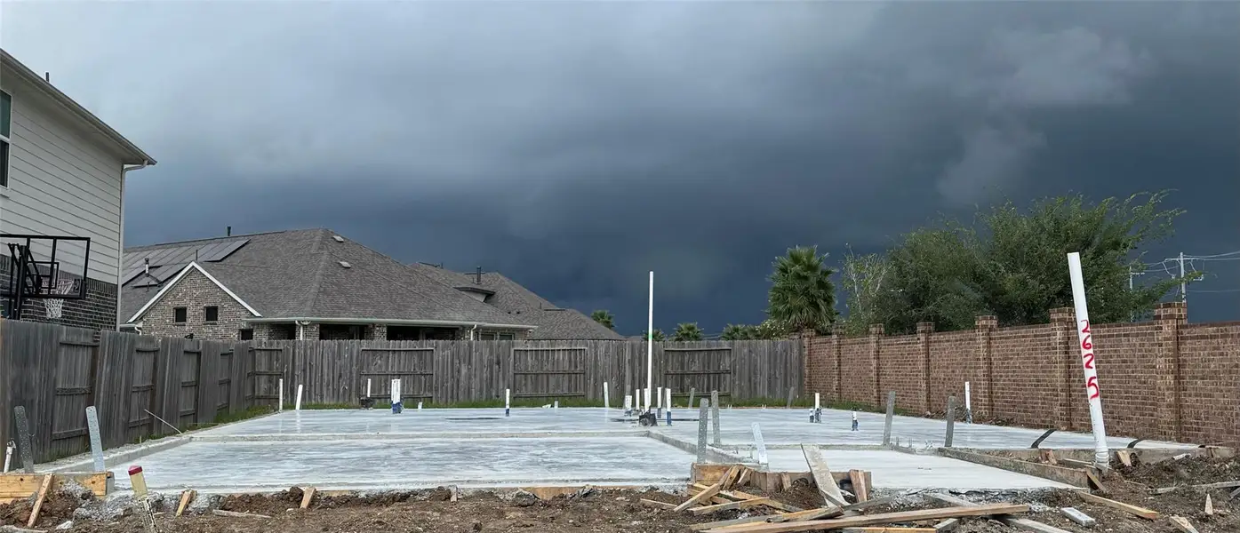 Front exterior of a new home in Lago Mar 50' at Lago Mar, Texas City, TX, highlighting curb appeal (Image 2). Front exterior of a new home in Lago Mar 50' at Lago Mar, Texas City, TX, highlighting curb appeal (Image 2).