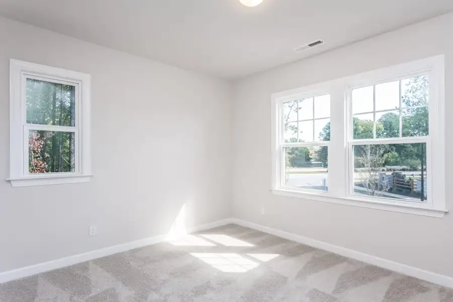 Spacious, unfurnished interior of a new home in The Townes at Willow Park, Cary (Image 17).