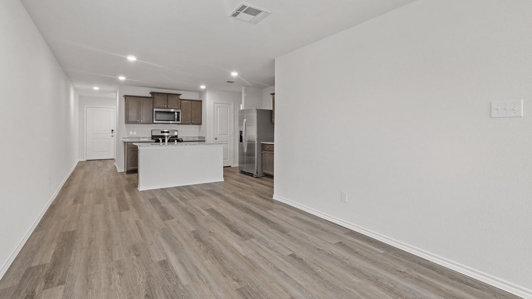 Representative unfurnished interior of a home built from the 1582 Shelby (Enclave Plan) by D.R. Horton in Elevon, Lavon (Image 10). Representative unfurnished interior of a home built from the 1582 Shelby (Enclave Plan) by D.R. Horton in Elevon, Lavon (Image 10).
