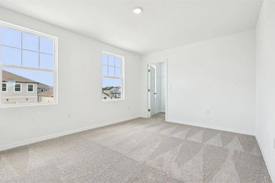 Spacious, unfurnished interior of a new home in Ardisia Park, New Smyrna Beach (Image 20).