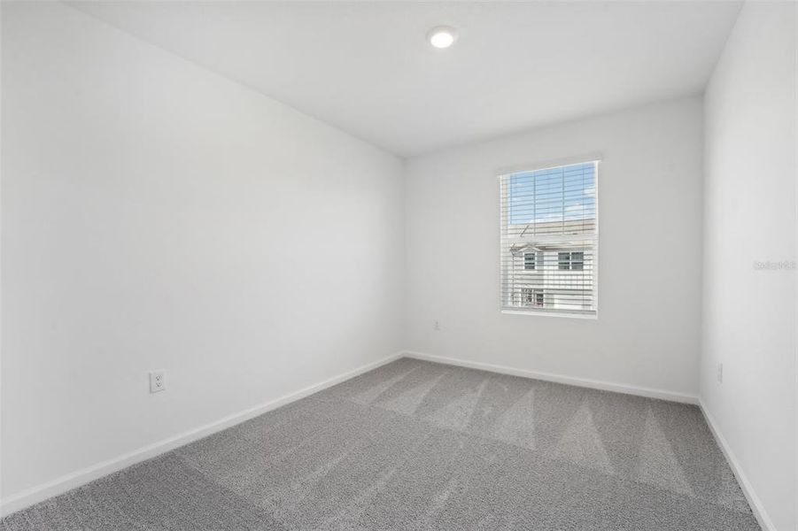 Spacious, unfurnished interior of a new home in Vista Walk, Dade City (Image 20).