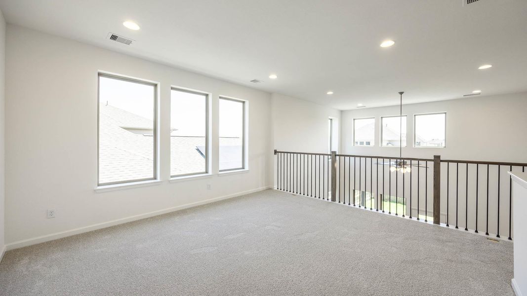 Spacious, unfurnished interior of a new home in Santa Rita Ranch - Tierra Rosa, Liberty Hill (Image 14).