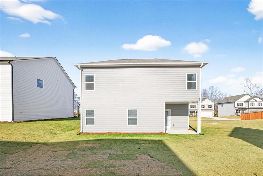Exterior details and patio area of a home in Garrett Preserve, Douglasville (Image 2).