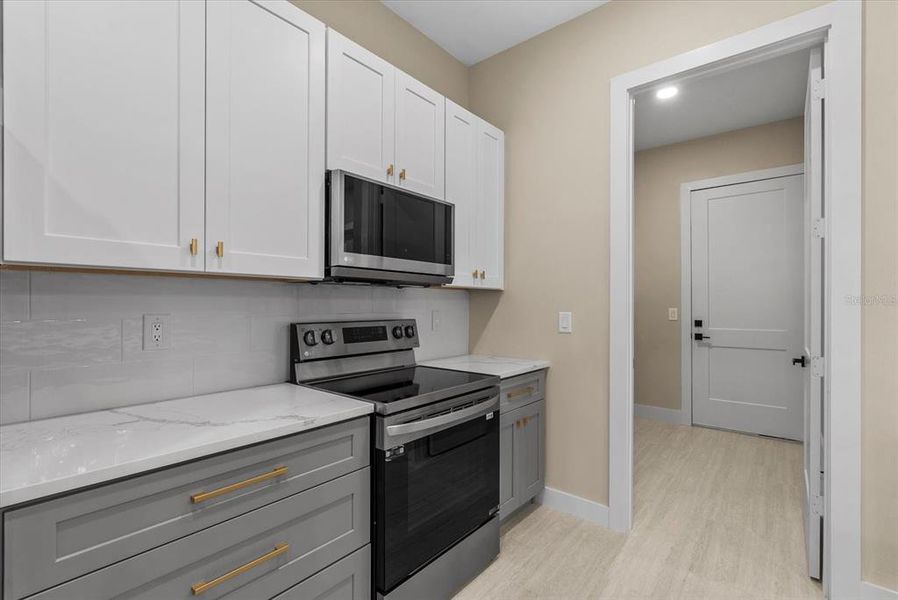 Furnished interior view inside a new home in , Port Charlotte (Image 11). Furnished interior view inside a new home in , Port Charlotte (Image 11).