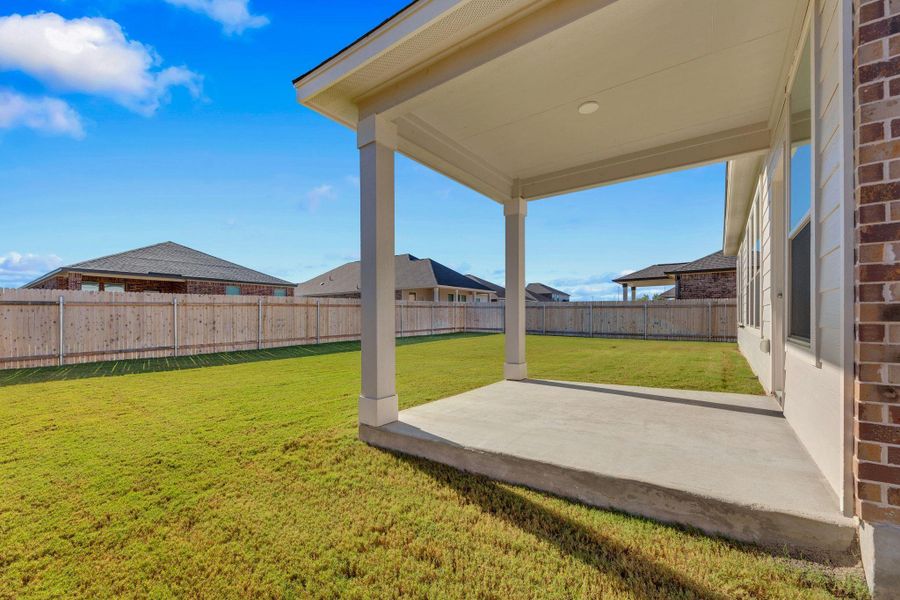 Exterior details and patio area of a home in Mustang Valley, Manor (Image 3). Exterior details and patio area of a home in Mustang Valley, Manor (Image 3).
