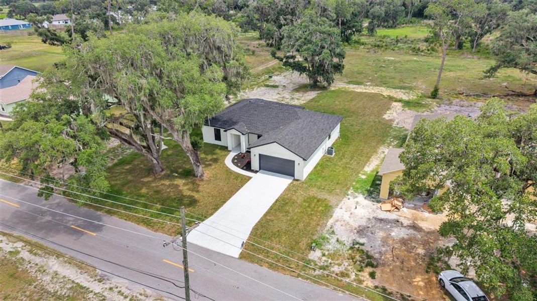 Front exterior of a new home in , Bartow, FL, highlighting curb appeal (Image 2). Front exterior of a new home in , Bartow, FL, highlighting curb appeal (Image 2).