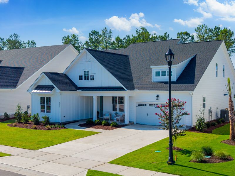 Representative exterior photo of a completed home built from the Lumina Island by Kent Homes in Terrapin, Leland, NC (Image 37). Representative exterior photo of a completed home built from the Lumina Island by Kent Homes in Terrapin, Leland, NC (Image 37).