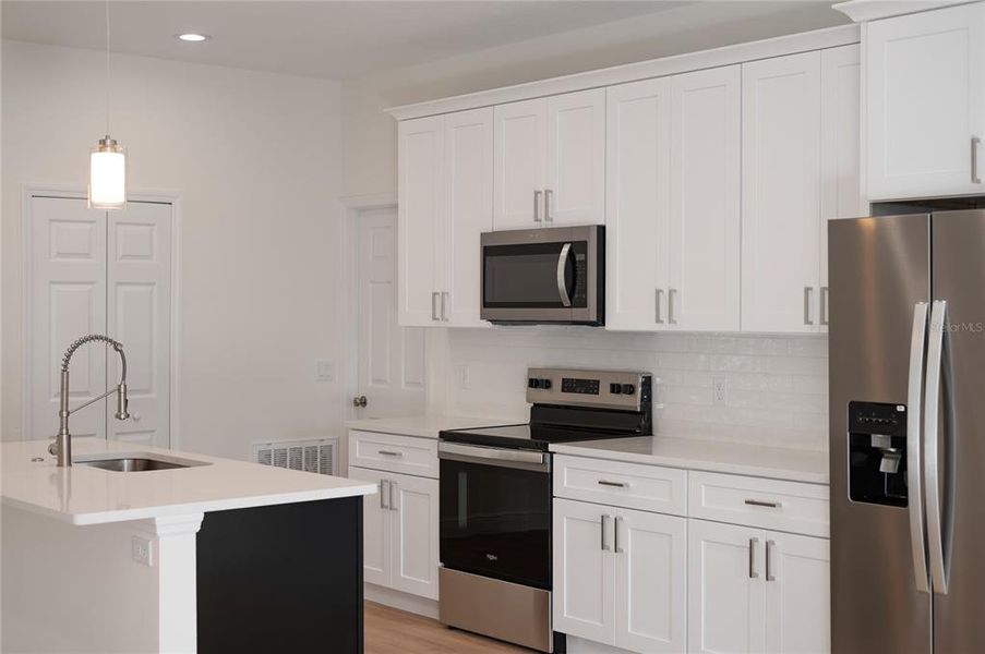 Furnished interior view inside a new home in , Osteen (Image 12).