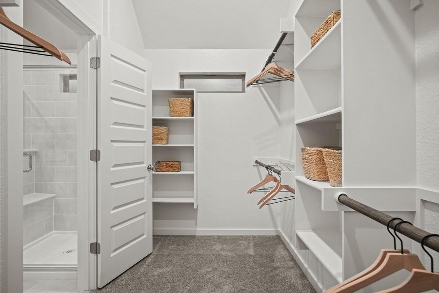 Primary Closet in the Oak home plan by Trophy Signature Homes – REPRESENTATIVE PHOTO