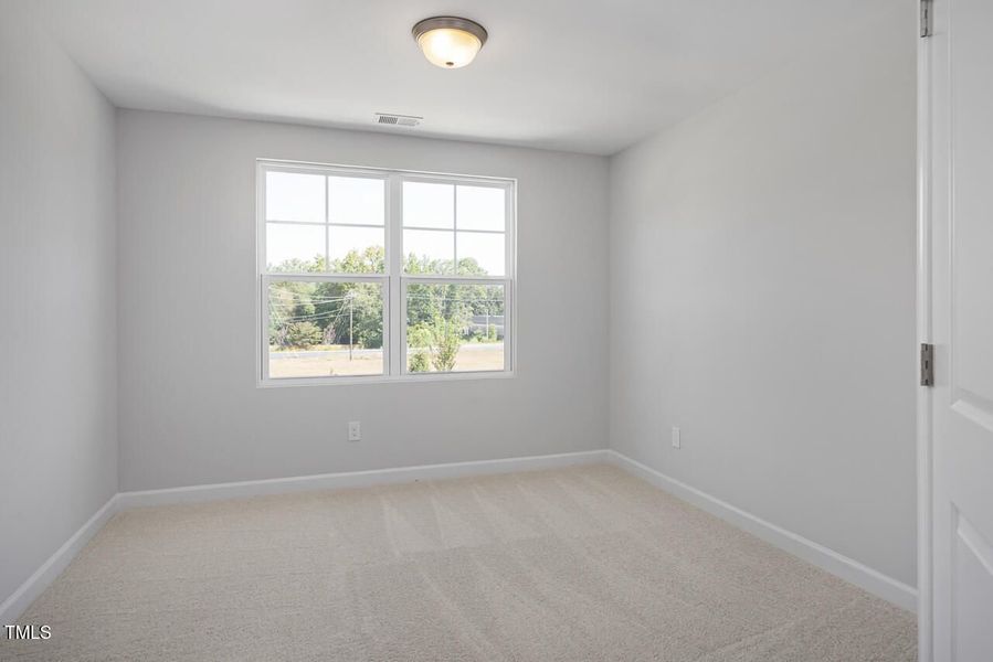 Spacious, unfurnished interior of a new home in Springvale, Fuquay Varina (Image 36).