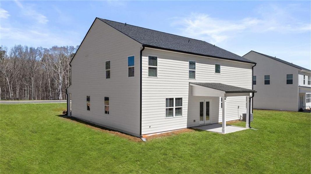 Exterior details and patio area of a home in Kingston Ranch at Lake Oconee, Buckhead (Image 31).