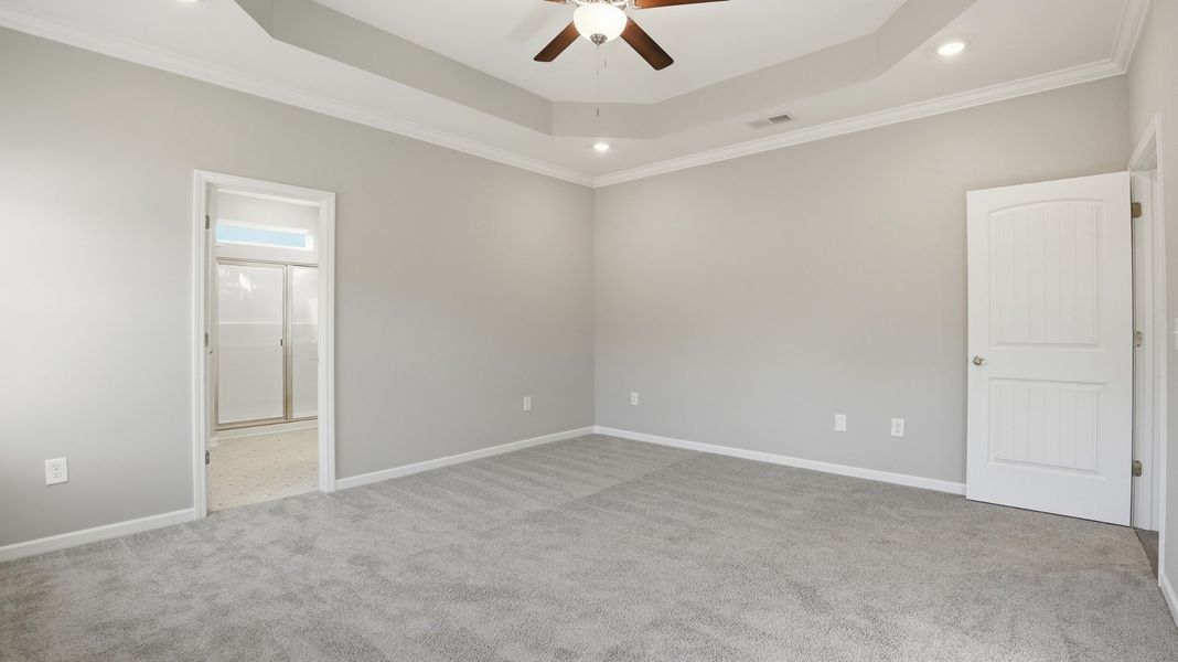 another view of the primary bedroom