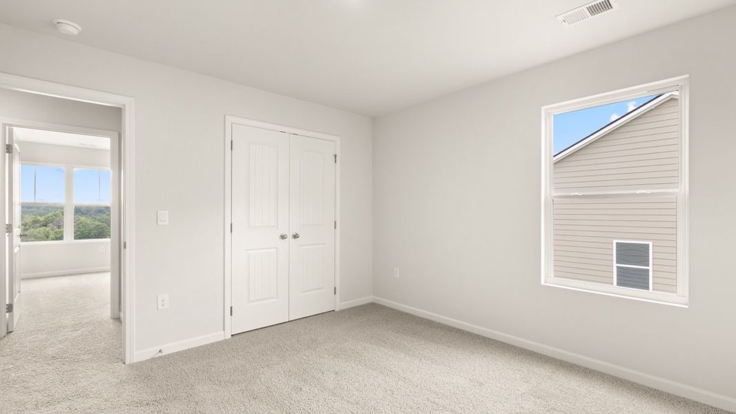 Representative unfurnished interior of a home built from the Halton by D.R. Horton in Liberty Crossing, Braselton (Image 29).