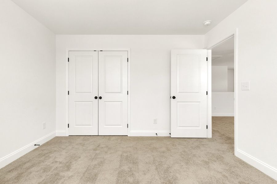 Representative unfurnished interior of a home built from the Titusville II by Regent Homes in Marlon's Creek, Spring Hill (Image 41).
