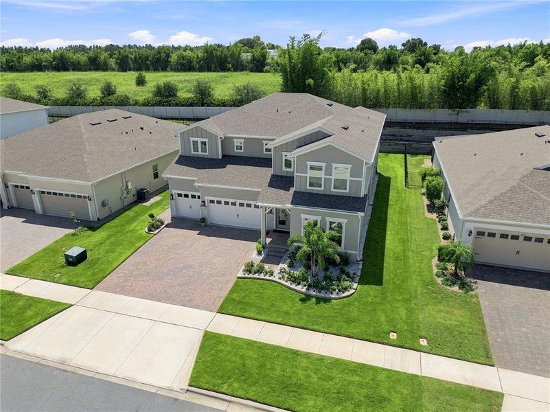 Front exterior of a new home in , Winter Garden, FL, highlighting curb appeal (Image 26).