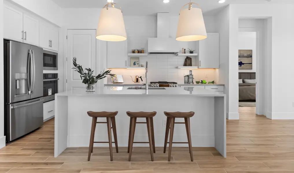 Kitchen with pendant lighting and full height-backsplash Kitchen with pendant lighting and full height-backsplash