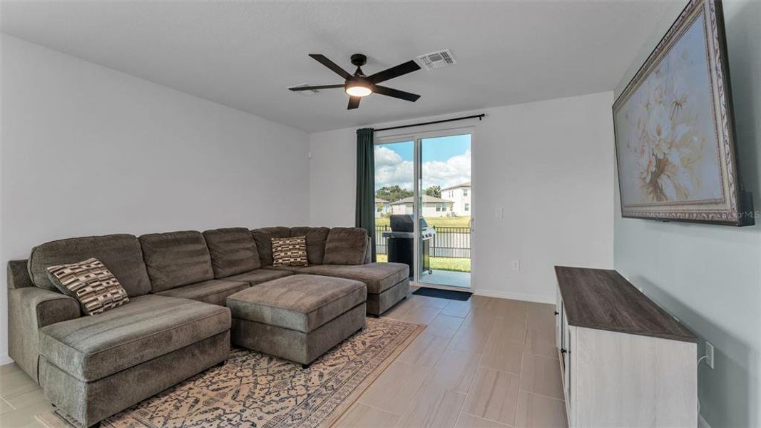 Furnished interior view inside a new home in The Grove at Stuart Crossing - Premier Series, Bartow (Image 7).