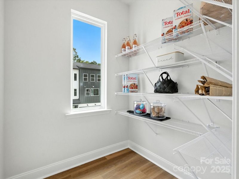 Generously Sized Walk-In Pantry Off Kitchen. *Model Photos | Actual Finishes, Structural Selection, and Orientation May Vary.