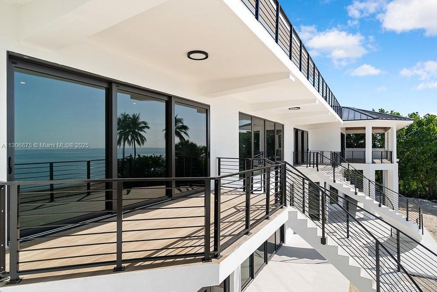 Mirrored Staircases from 2nd Floor to Pool Area Mirrored Staircases from 2nd Floor to Pool Area