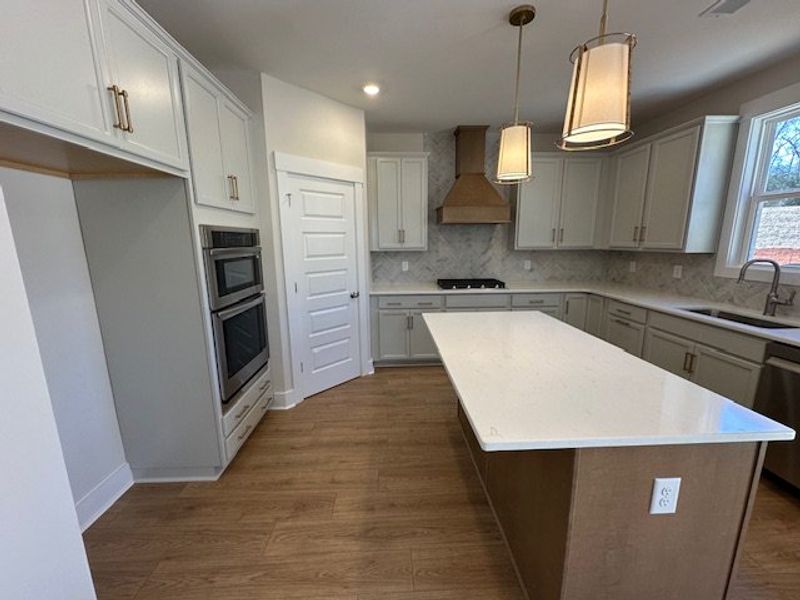 This modern kitchen features a spacious island and