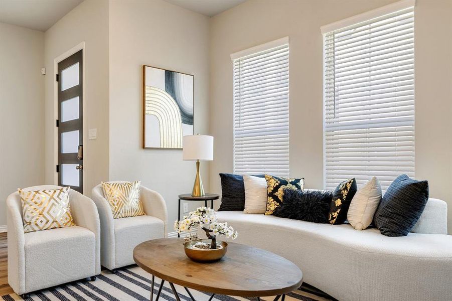 Living room with hardwood / wood-style flooring