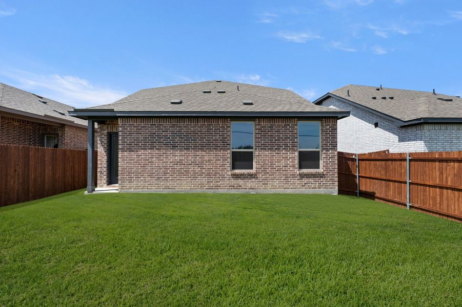 Front exterior of a new home in Churchill, Anna, TX, highlighting curb appeal (Image 27). Front exterior of a new home in Churchill, Anna, TX, highlighting curb appeal (Image 27).