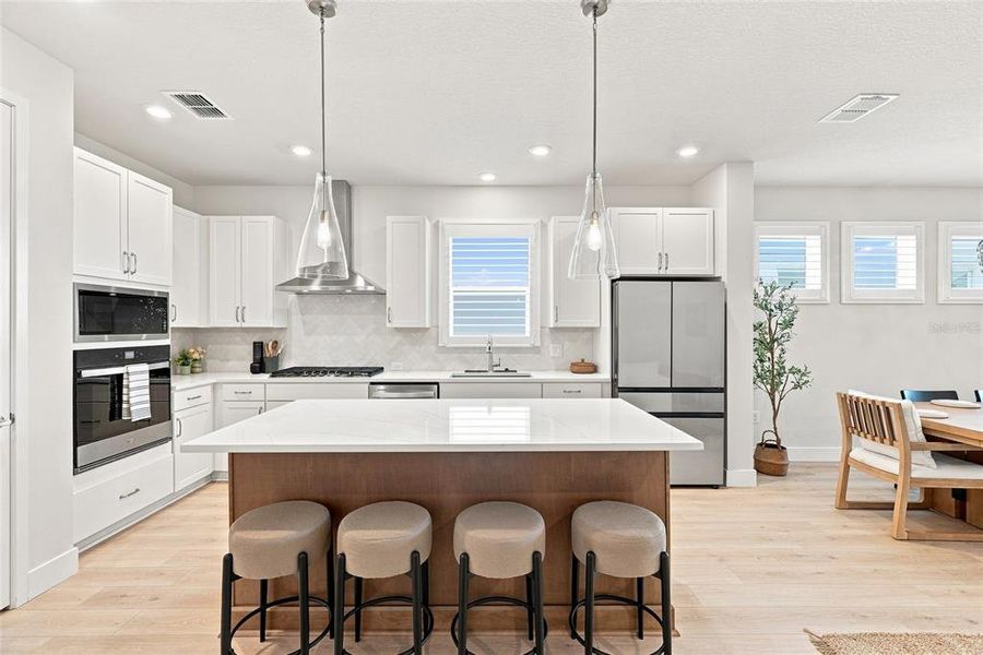 Furnished interior view inside a new home in SeaFlower – Bungalow Homes, Bradenton (Image 14).