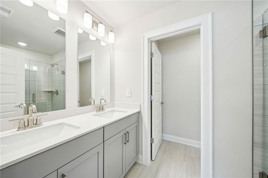 Furnished interior view inside a new home in Hemingway - Cottage Series, Cumming (Image 9). Furnished interior view inside a new home in Hemingway - Cottage Series, Cumming (Image 9).