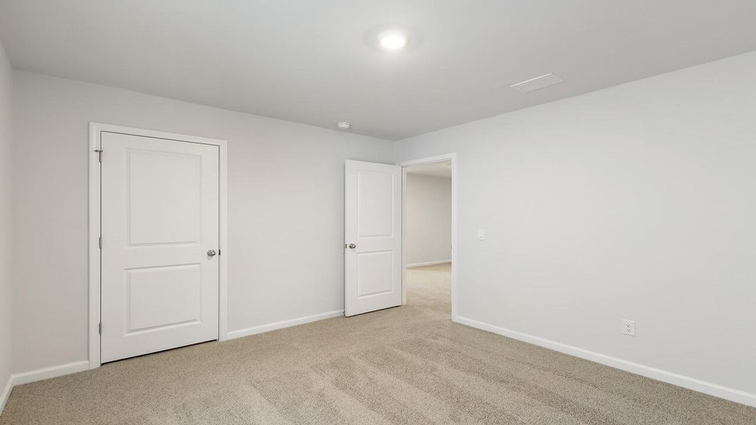 Spacious, unfurnished interior of a new home in The Cove at Mallard Crossing, Summerville (Image 21).